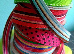 bright colored ribbons on spools